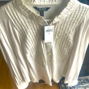 Cream colored long sleeve Ralph Lauren part front button down with gold trim.